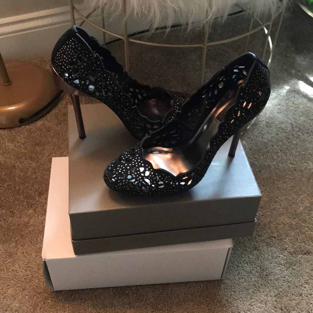 BCBG Maxazria/Black w/ chrome heel/ Size 10